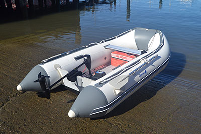 small inflatable boat with outboard motor