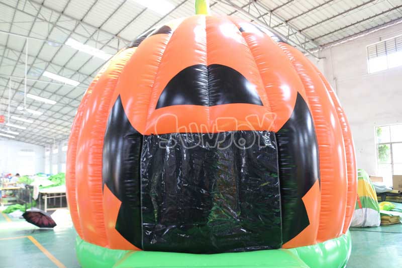 inflatable pumpkin bounce house front