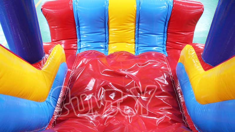 inflatable rainbow castle combo slide