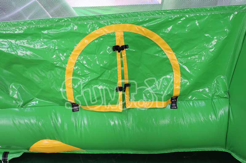 green dinosaur inflatable combo front door