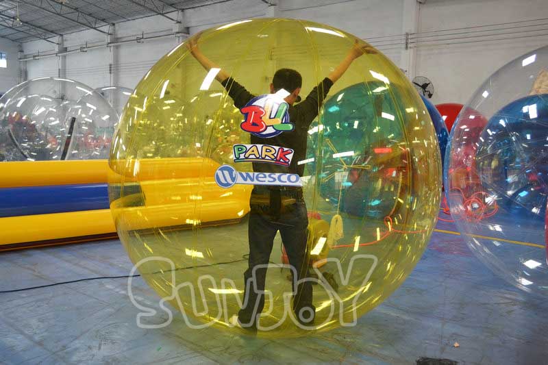 yellow human hamster ball for water