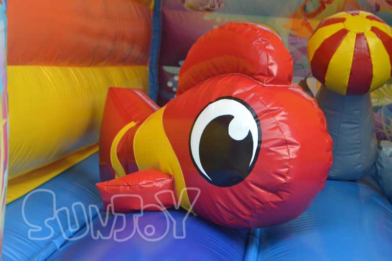 ocean theme bounce house fish obstacle