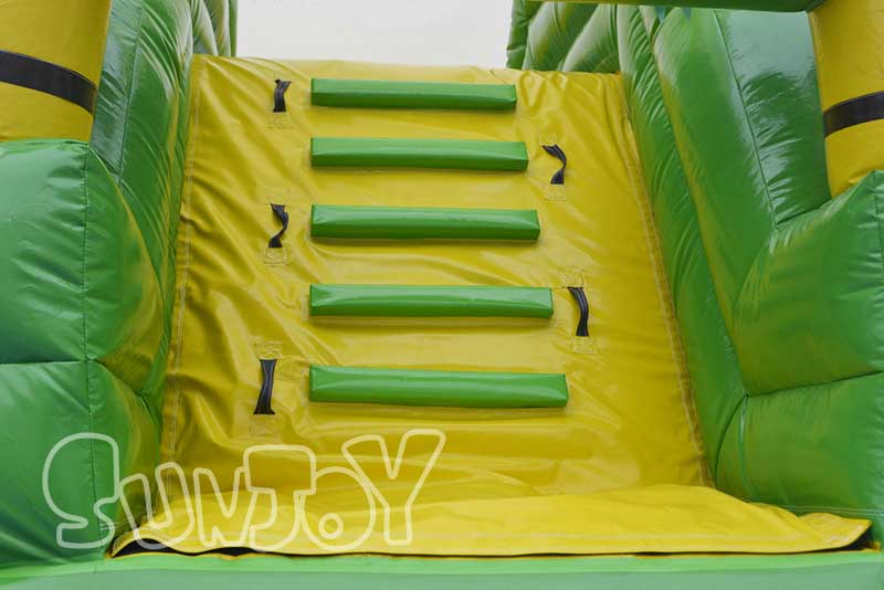 green jungle water slide climbing wall