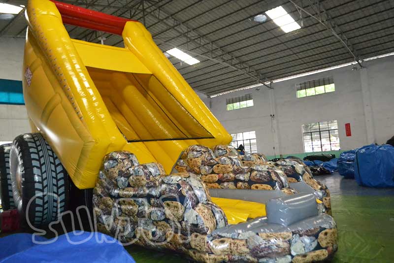 heavy haulin dump truck inflatable slide