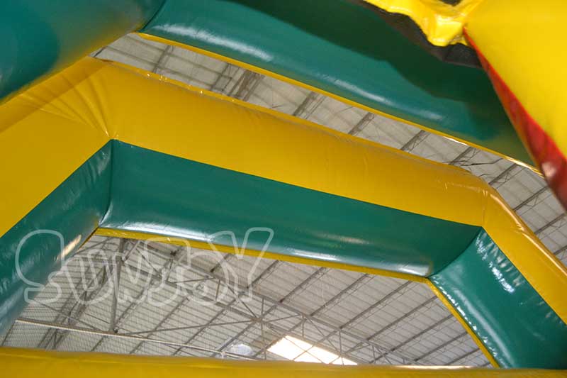 inflatable slide top structure and netting