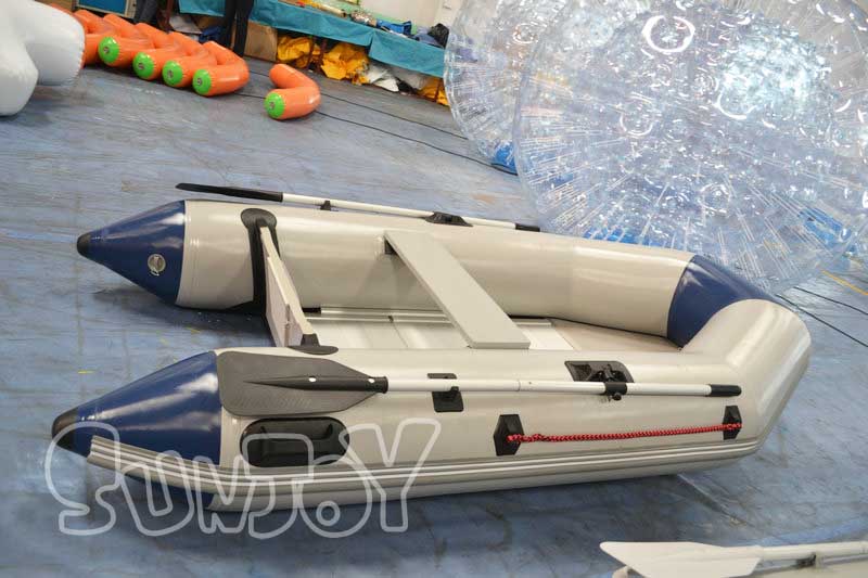 light gray inflatable motor boat