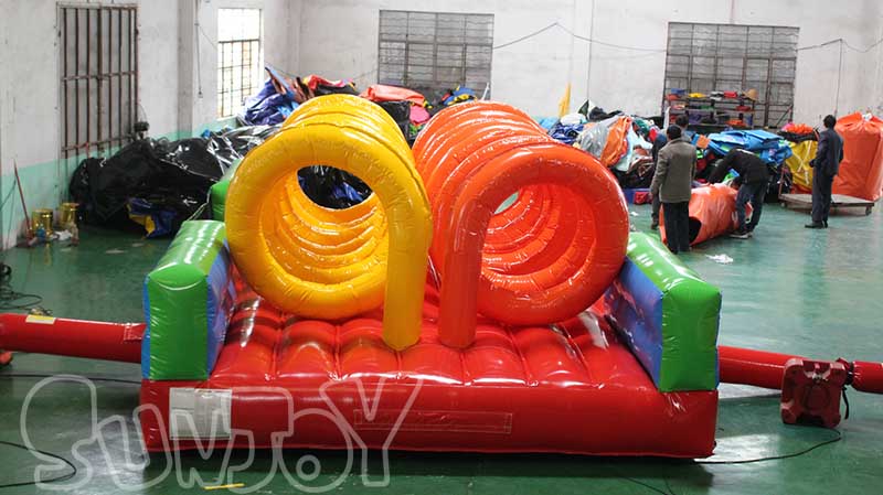 curly fries inflatable obstacle course