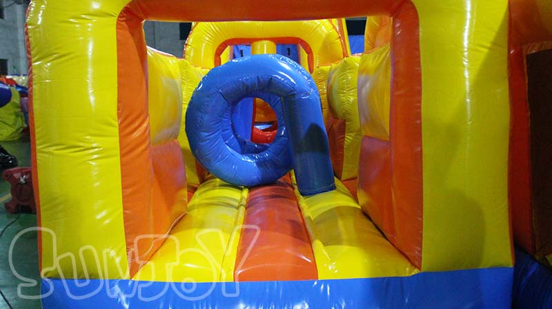 S-shaped inflatable obstacle course entrance obstacle