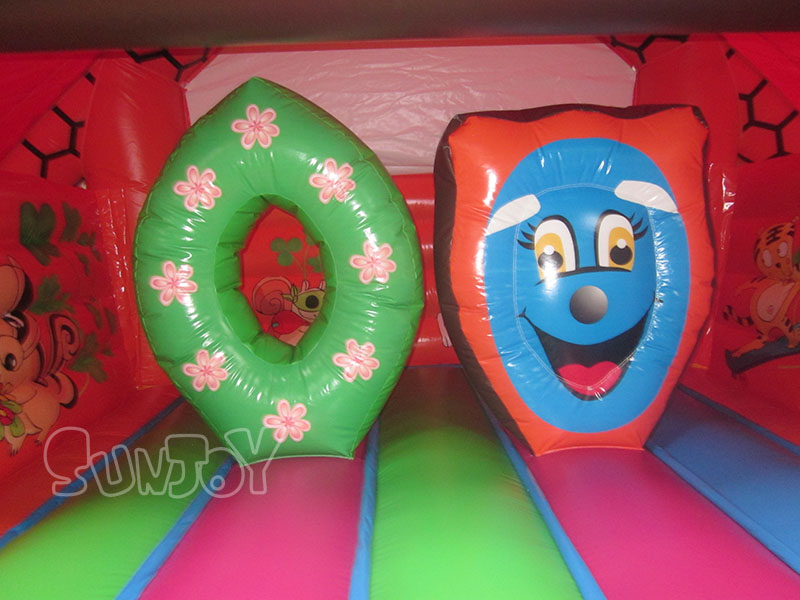 13x13 cartoon bounce house inside obstacles