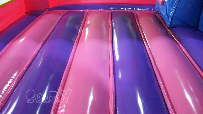 pink unicorn bouncy castle bouncing area