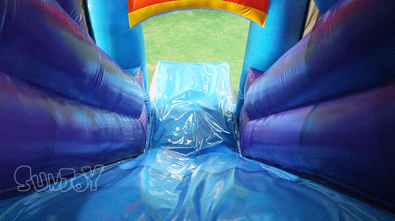 pink unicorn bouncy castle slide