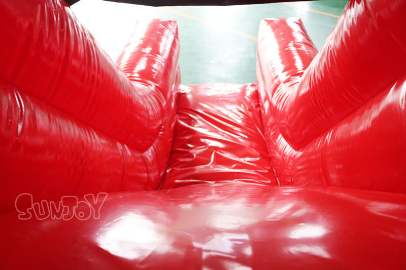 red bouncy castle combo slide