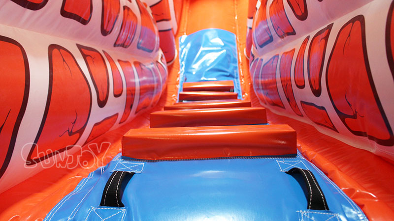 orange castle inflatable slide climbing