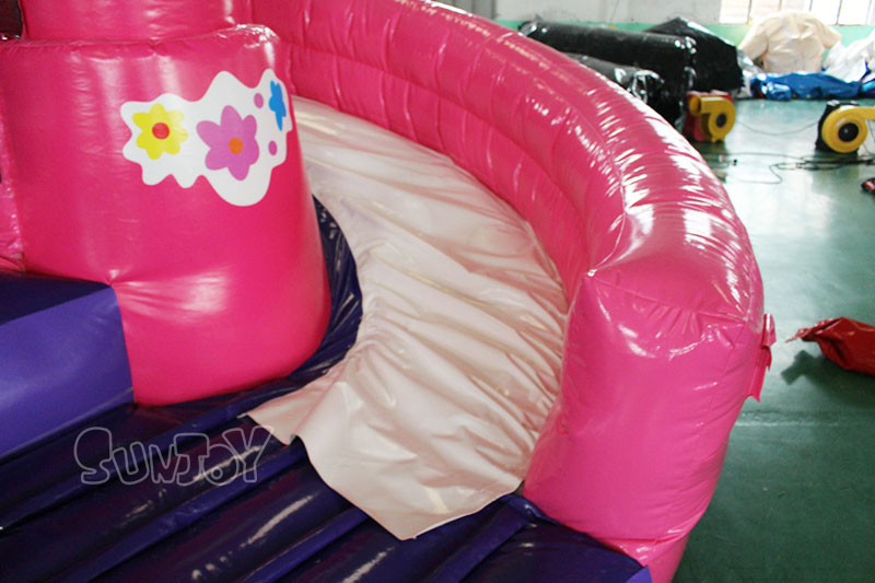 pink jumping castle combo slide exit