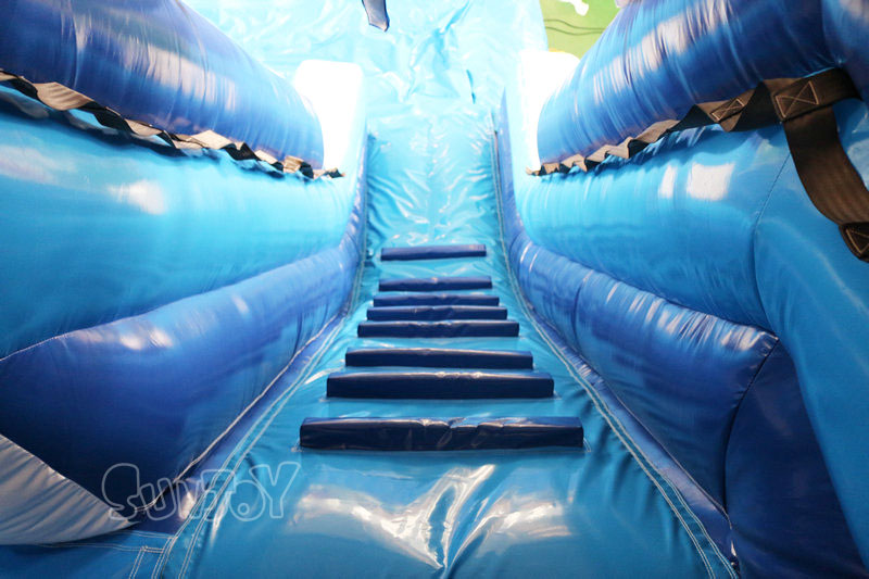 blue arched end water slide climbing