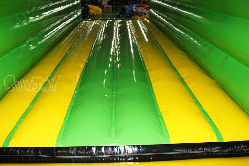 green tractor bounce house jumping floor