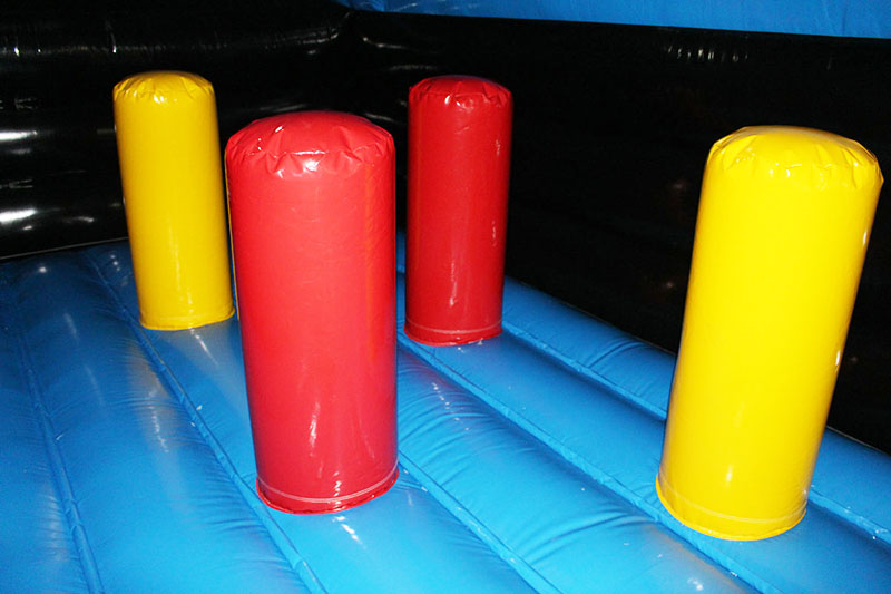 blue tractor bounce house pillars obstacle